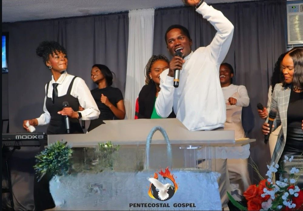Worship leaders singing and dancing